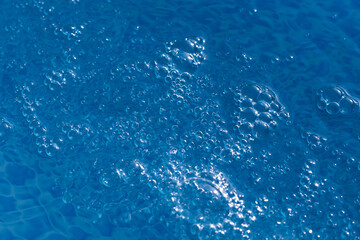 blue water with bubbles and blue drops background