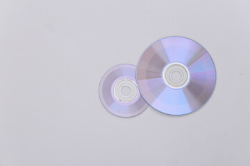 Compact disсs on white background. Top view