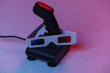 Retro joystick with 3d glasses in red blue neon light. Attributes 80s