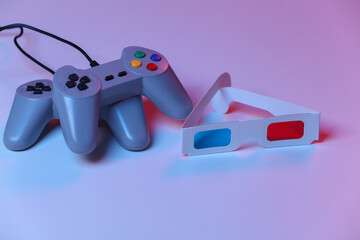 Retro gamepads with 3d glasses in red blue neon light. Attributes 80s