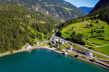 Switzerland, Poschiavo lake, small station of the Rhaetian railway in Miralago