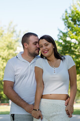 Fototapeta premium Happy young couple holding hands