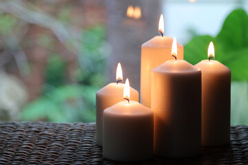 Obraz na płótnie Canvas burning candles on the table