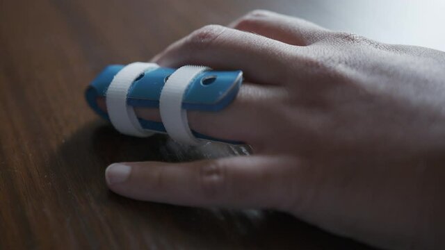 Close Up of a Hand with a Finger Splint