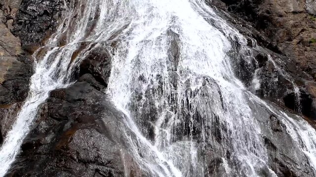 Water flowing over Dudhsagar waterfall