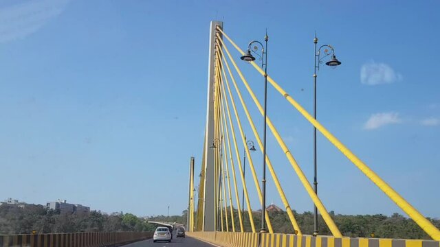 Cars passing the Atal Setu cable bridge over Mandovi River