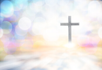 Jesus cross is used as an abstract concept background with bokeh blur background