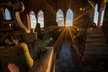 Sun rays entering through a window of the Mudejar tower of El Salvador in Teruel