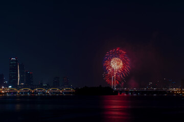 Beautiful Fire works show and reflection on the river,