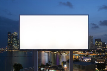 Blank white road billboard with Singapore cityscape background at night time. Street advertising poster, mock up, 3D rendering. Front view. The concept of marketing communication to sell idea.