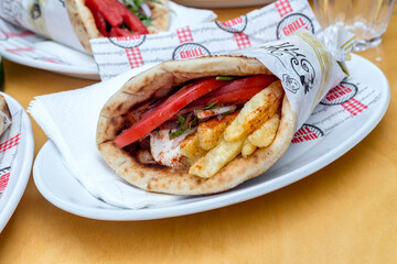 The traditional Greek snacks grilled (soufflaki) close-up