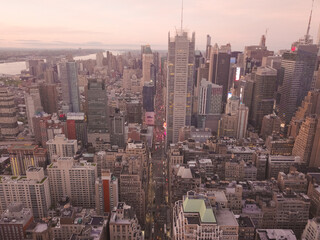 Fototapeta premium Aerial View in the heart of Manhattan, New York City with Timessquare Street View and Tall Skyscraper Canyon