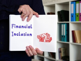 Business concept meaning Financial Inclusion with phrase on the sheet.