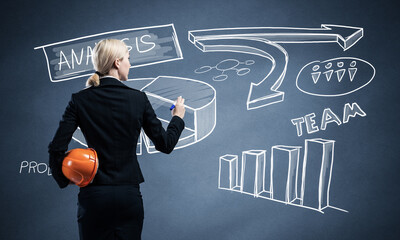 Businesswoman draws various business infographics