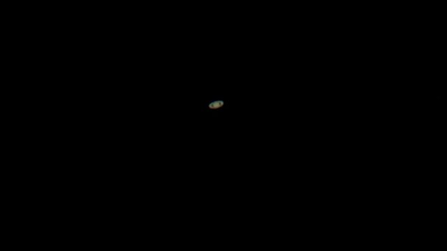 Saturn with rings as seen through small backyard telescope