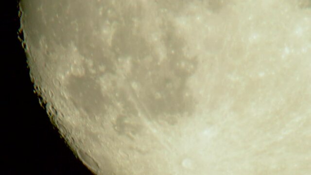Moon close up craters terminator side large magnification air disturbance distortion