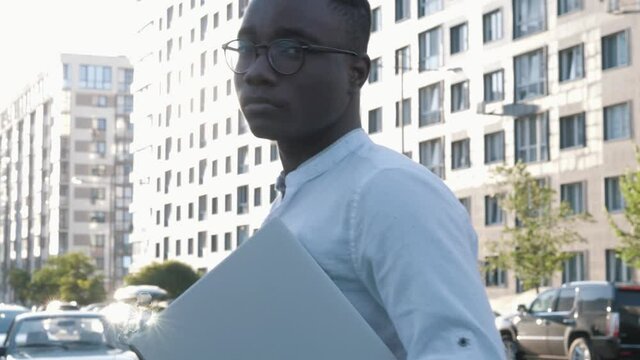 Portrait serious face african american man ooking at camera enjoying in urban city handsome confident lifestyle street urban attractive close up confidence outdoors
