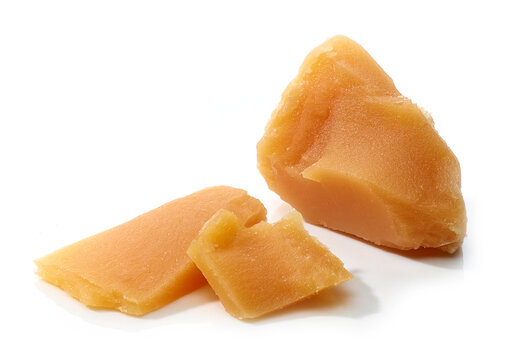 caramel pieces on white background