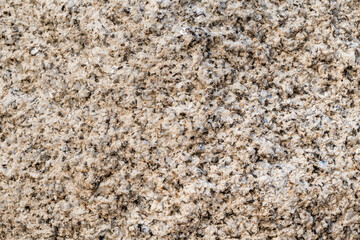 texture of a porous stone in brown tones