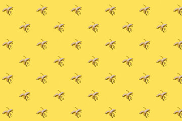 banana pattern  on  yellow background, flat lay.