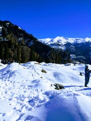 hiker in winter mountains