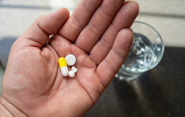 different tablets for taking inside lie on the palm of the hand