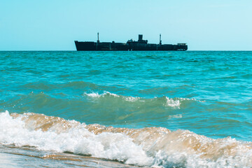 A shipwreck. An old wreck abandoned at sea. The wreck of the ship 