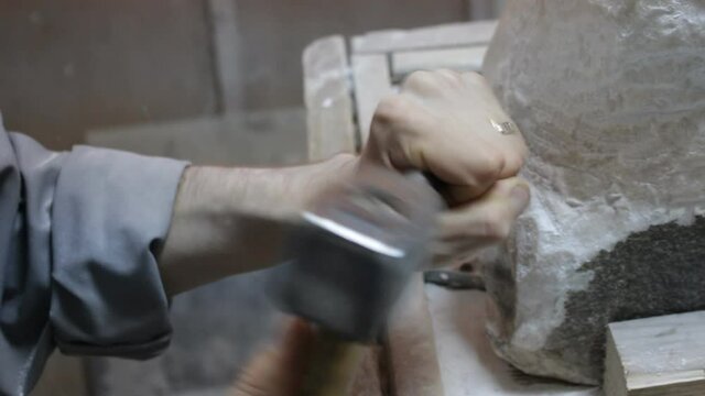 Sculptor Carving On Marble. Working with stone and sculpting statue