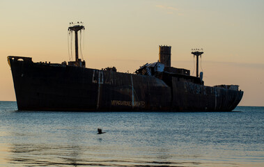 A shipwreck. An old wreck abandoned at sea. The wreck of the ship 