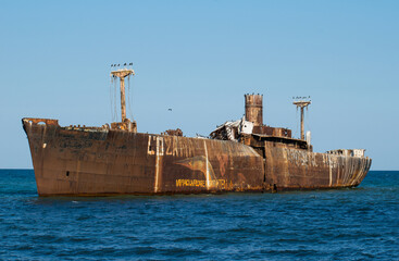 A shipwreck. An old wreck abandoned at sea. The wreck of the ship 