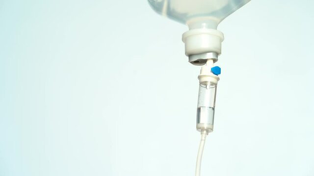 4K. Closeup of IV drip in hospital, Intravenous saline solution, IV loading dose.