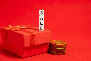 super sale banner with white letters cubes and gift box