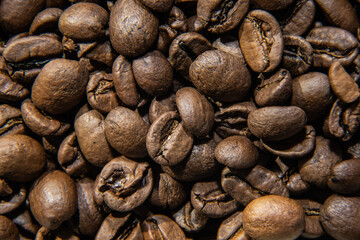 many coffee beans lie together on the table