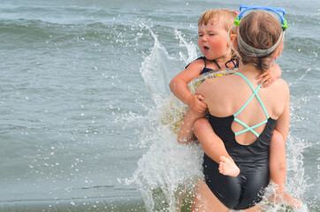 Fototapeta premium Caucasian children outdoor in summer lifestyle on the beach