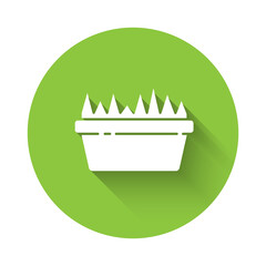 White Fresh grass in a rectangular icon isolated with long shadow. Home decor. The symbol of growth and ecology. Green circle button. Vector Illustration.