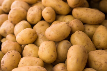 potatoes on counter in market