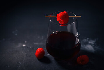 Natural raspberry tincture or raspberry wine. Tibetan raspberries