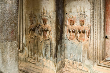 Apsara sculptures in bas-relief and stone balustrade, in Angkor Wat, Siem Reap, Cambodia