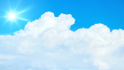 Naklejka na ściany i meble typical blue sky with sun and clouds background