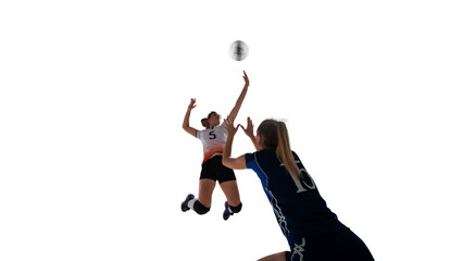 Female professional volleyball players in action on white background.