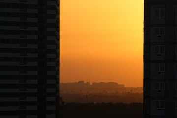 A bright orange sunset . Sunset. Natural summer phenomena