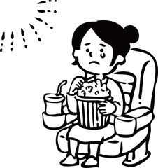 映画を見て感動する女の子