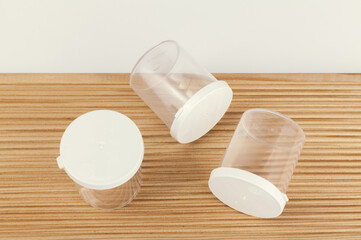 medical transparent plastic container with white lid