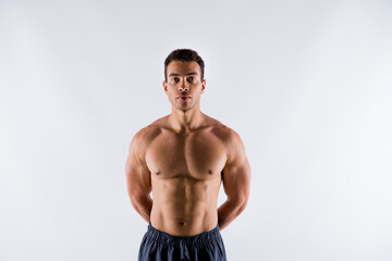 Portrait of his he nice attractive content virile guy ripped shape figure form personal trainer coach life lifestyle isolated over light white pastel color background