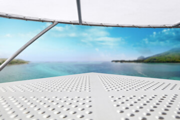 Fototapeta na wymiar White table of free space and blurred sea landscape 