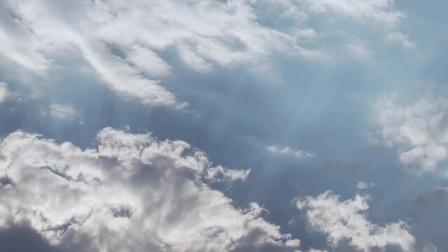 Clouds and Clear Sky during the Day, Time Lapse. The Sun Shines Through The Clouds. Pure Nitrogen Layer. Cloudy Weather.