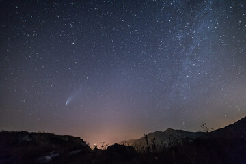 Fototapeta na wymiar Neowise comet and Milky way in the sky over Corsica