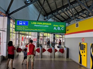 people in bus station