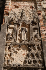 Broken ancient Buddha sculpture