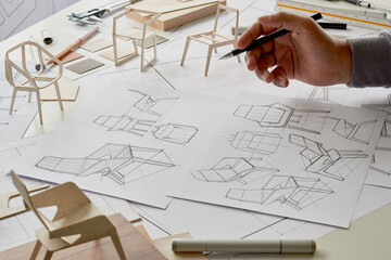 Designer sketching drawing design development product plan draft chair armchair Wingback Interior...